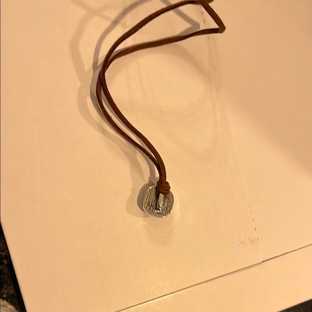 Brown Leather Necklace with Silver Pendant